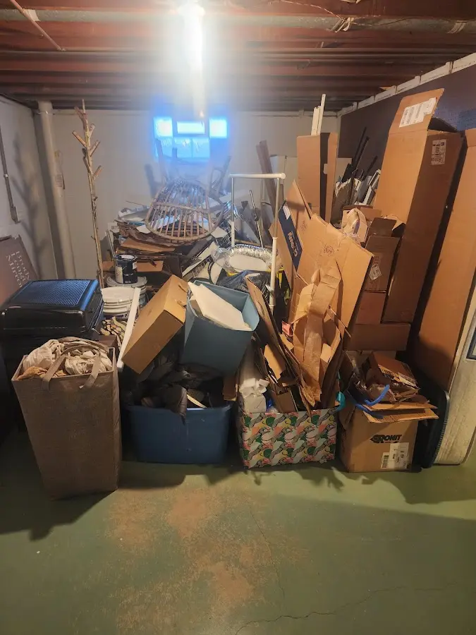 Roll-off dumpster container at job site for 2 Yard Dumpster Rental in Huntingburg